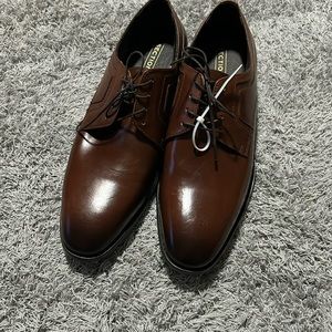 Brown sectionsX size 10M made in Brazil leather upper.